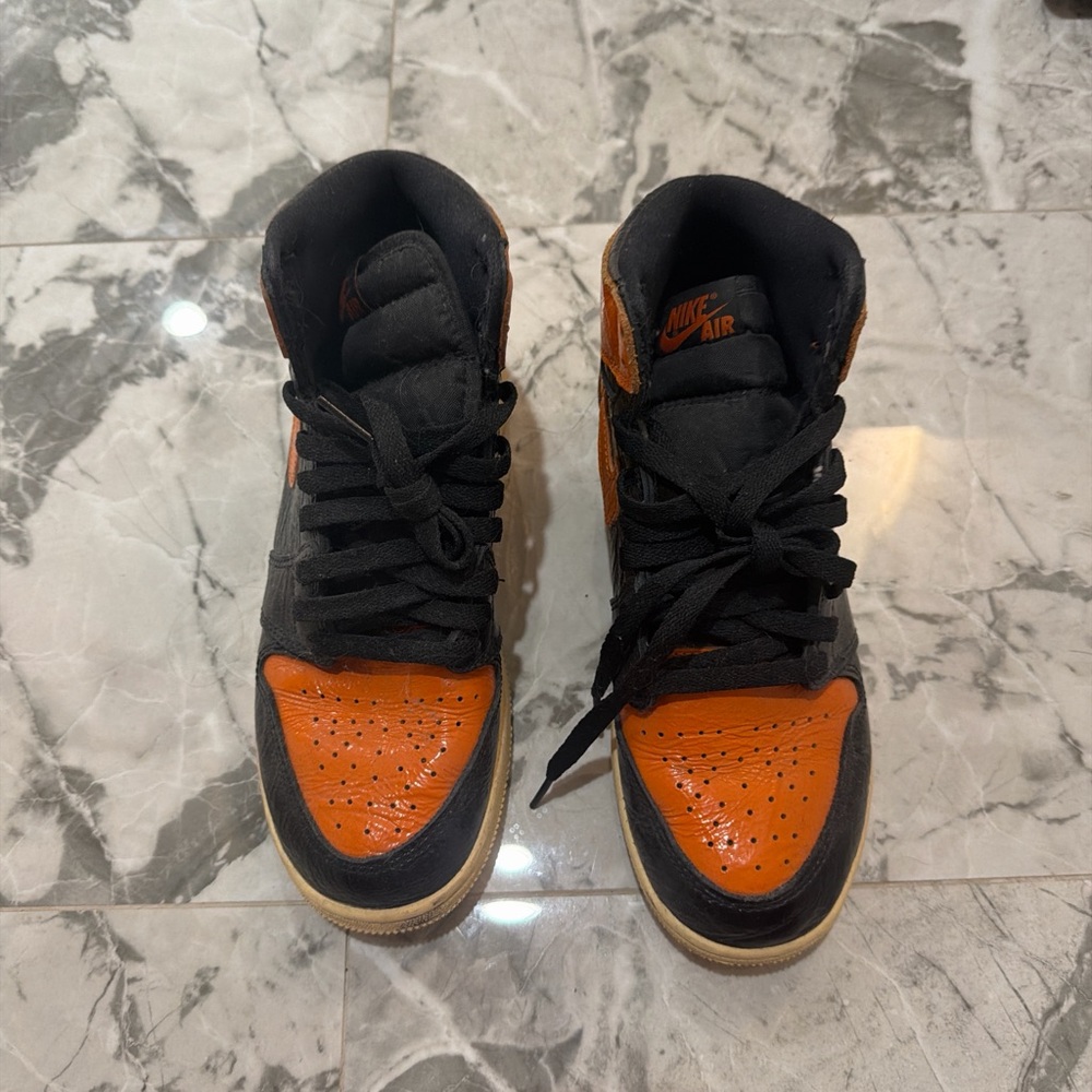 Nike Air Black and Orange High-Top Sneakers